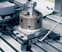 Plates for custom fixtures are available for QuickPoint base plates, such as this chuck. Using a QuickPoint base plate, fixtures can be changed on a machine in seconds. The fixture will always be located in a precise location, eliminating the need to re-set a program home position every time the fixture is installed.