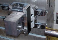 A PositiveLock system CenterCompact vise mounted on a QuickPoint base plate is a very secure way to hold a workpiece, as is shown in this demonstration. Using the QuickPoint base plate, the workpiece can also easily be turned 90 degrees for additional operations.